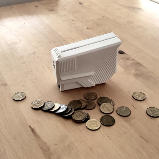 tzedakah box  ,   pushke   ,    money box   ,    piggybank
